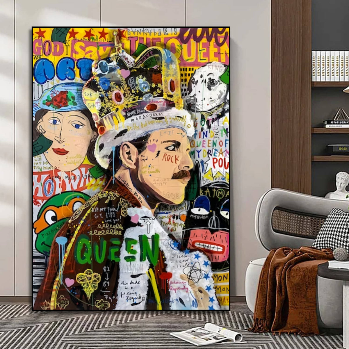 Room mockup showing colourful Freddie Mercury pop art portrait wearing a crown, surrounded by graffiti, lettering and a second crowned face.