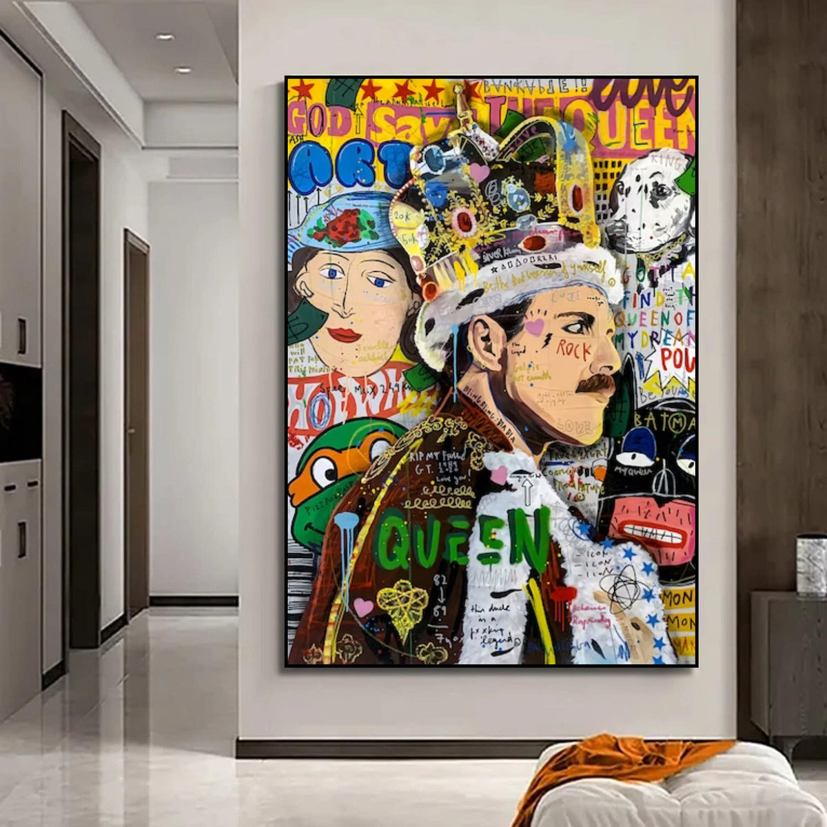 Room mockup showing colourful Freddie Mercury pop art portrait wearing a crown, surrounded by graffiti, lettering and a second crowned face.
