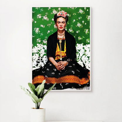 Framed artwork of a person with floral headpiece against a floral background