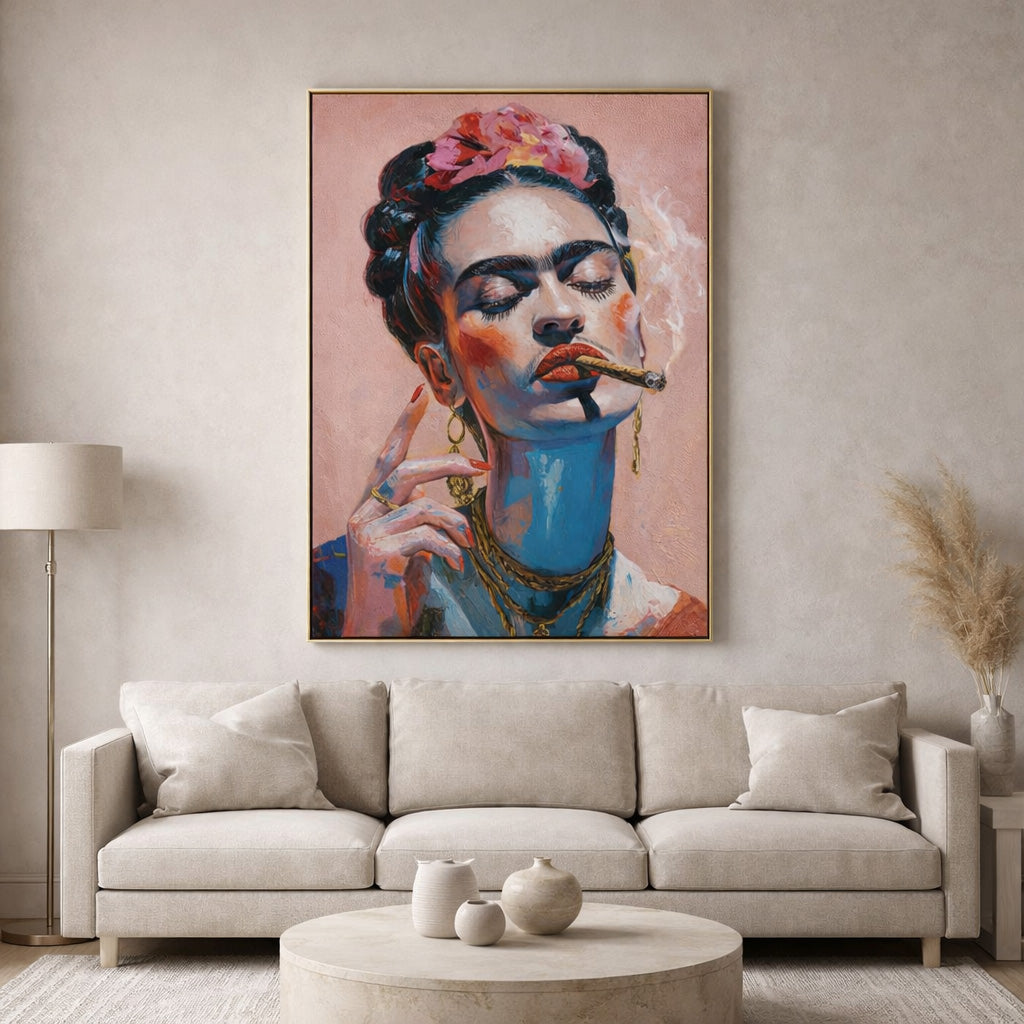 Framed artwork of a stylized portrait on a wall above a beige sofa.
