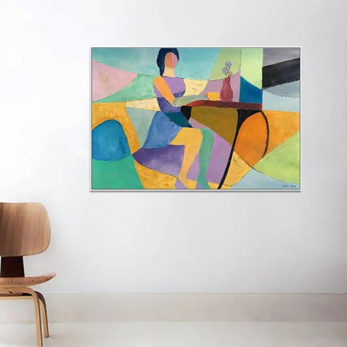 Room mockup. A stylised seated woman beside a table with a cup and flower vase, amid turquoise, yellow, orange and purple shapes.