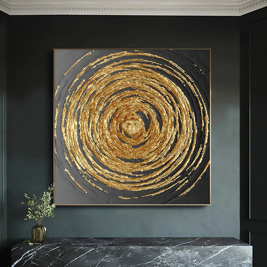 Room mockup showing rough gold-coloured concentric rings against a charcoal grey square background.