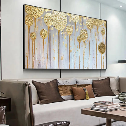 Room mockup showing round gold-coloured textured flower heads on long thin stems against pale grey and lavender vertical fields.