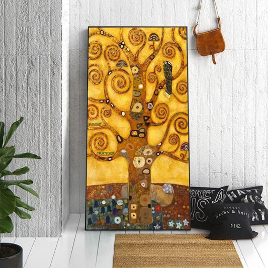 Gold spiral tree artwork against a white panelled wall above a bench and beside a hanging bag.
