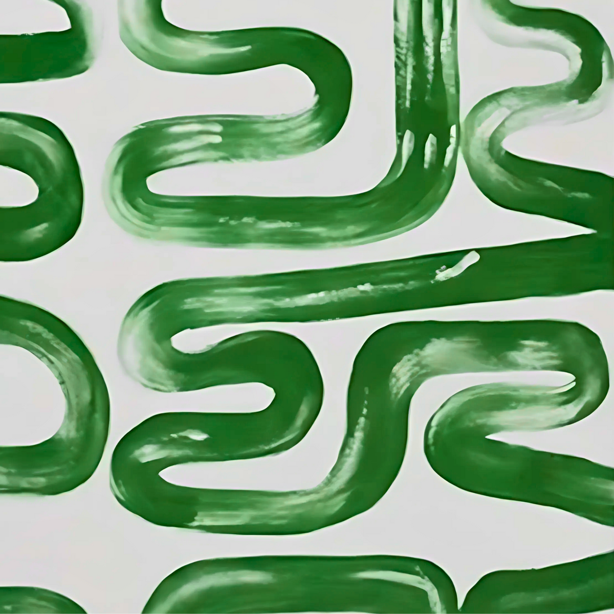 Detail of green meandering brushstrokes creating a curved pattern on white.
