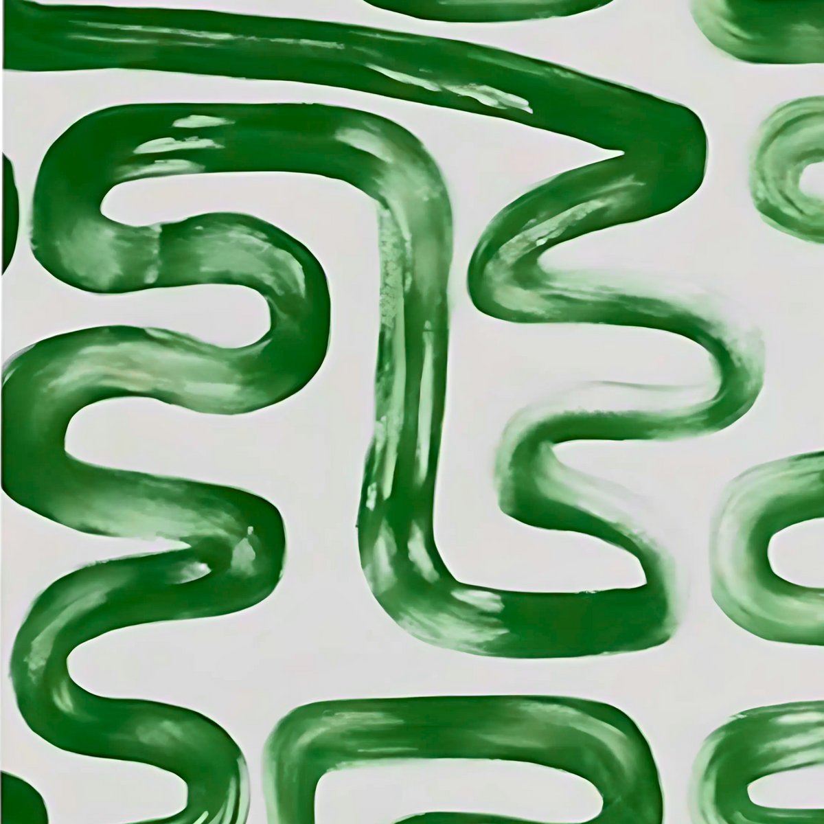 Detail of green meandering brushstrokes creating a curved pattern on white.