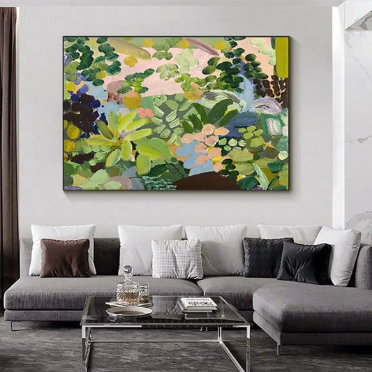 Room mockup showing overlapping green foliage-like shapes with pale pink, blue, yellow and dark purple patches in a dense garden-like composition.