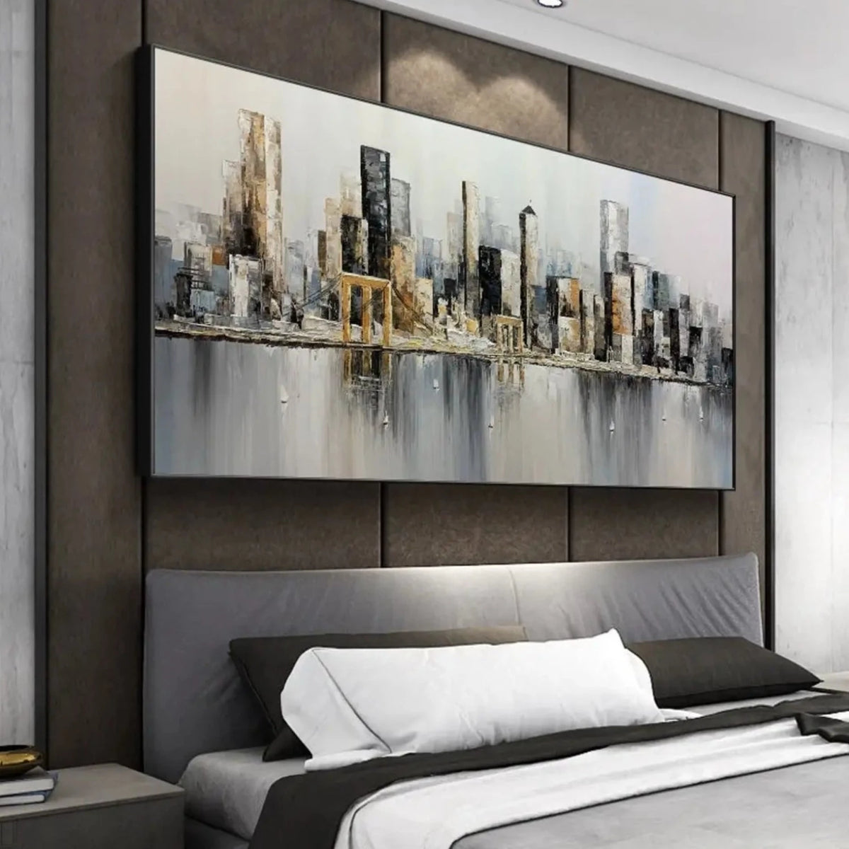 Room mockup showing slender grey and black city towers with gold-coloured accents reflected in a soft grey foreground.