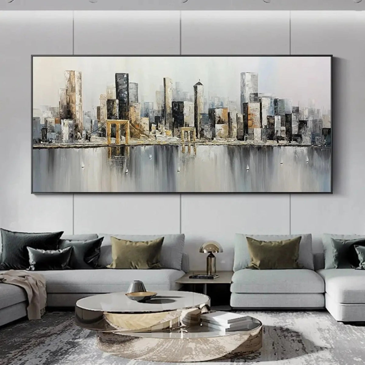 Room mockup showing slender grey and black city towers with gold-coloured accents reflected in a soft grey foreground.