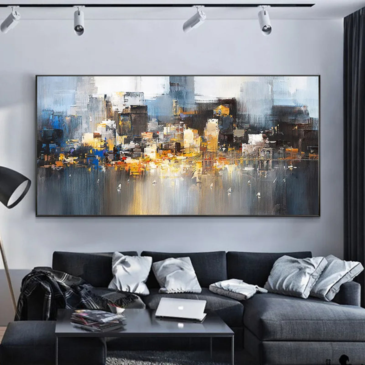 Room mockup showing abstract city-like blocks in grey, blue, black and gold-coloured tones reflected across a pale lower area.