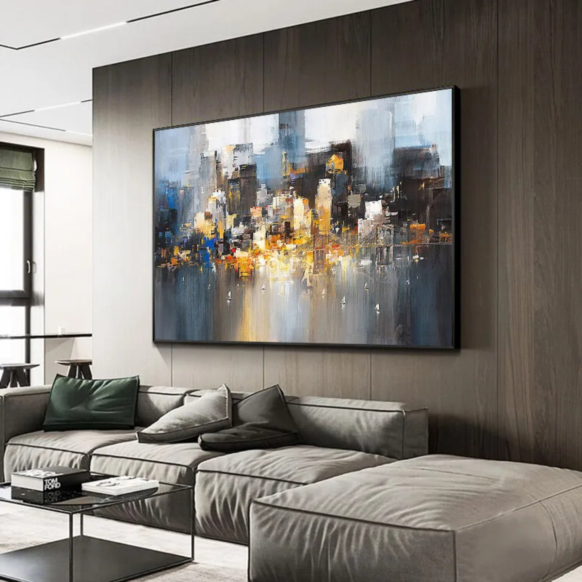 Room mockup showing abstract city-like blocks in grey, blue, black and gold-coloured tones reflected across a pale lower area.