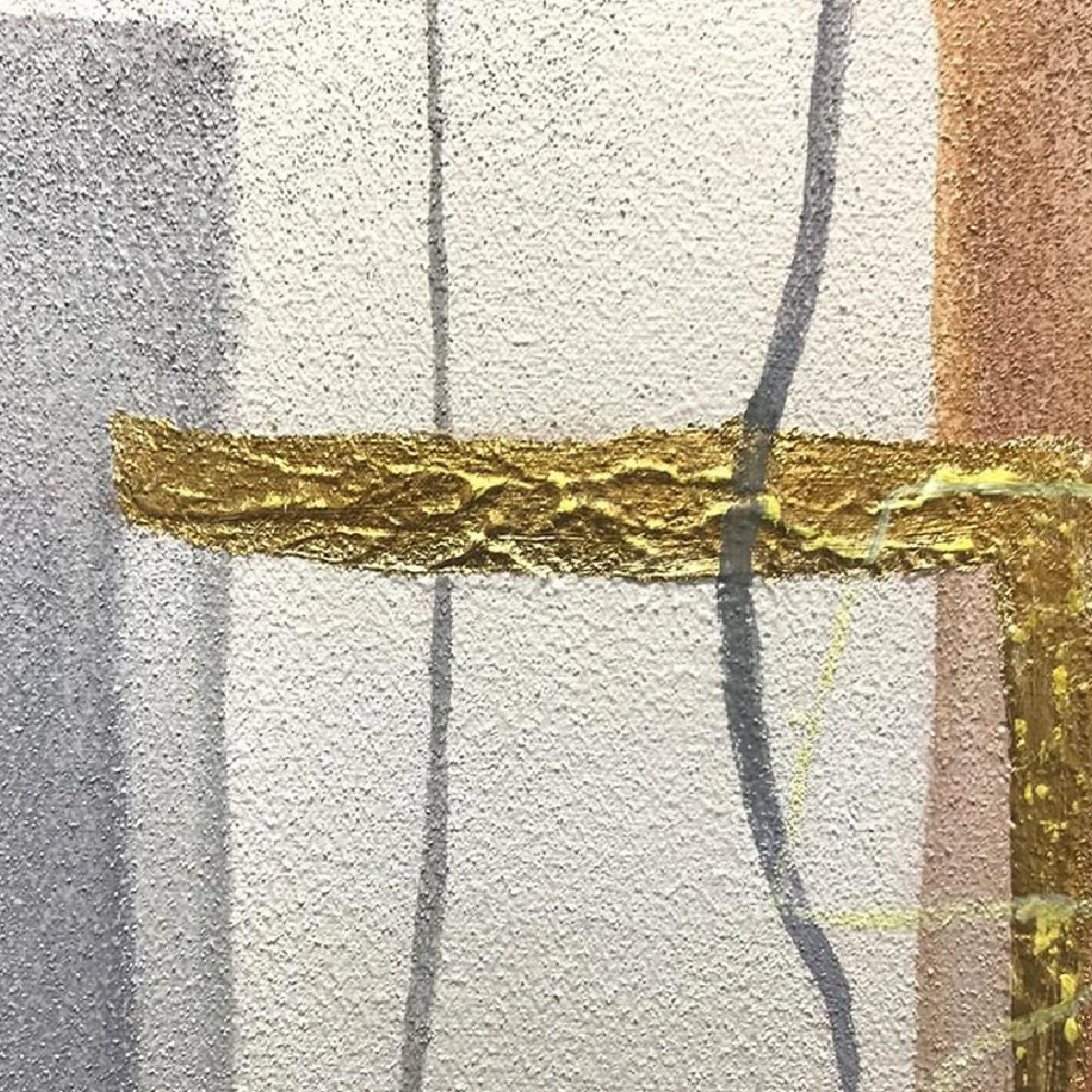 Close-up of a raised gold-coloured strip crossing pale grey textured fields and thin dark curved lines.