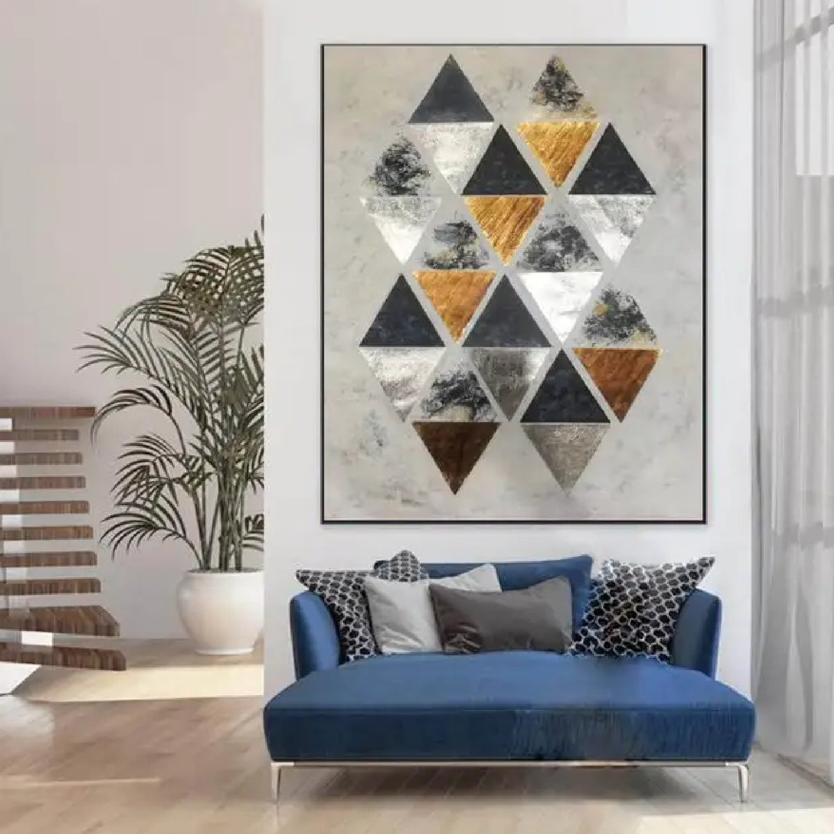 Room mockup. A staggered cluster of black, grey, white and ochre triangles on a pale cream textured ground.