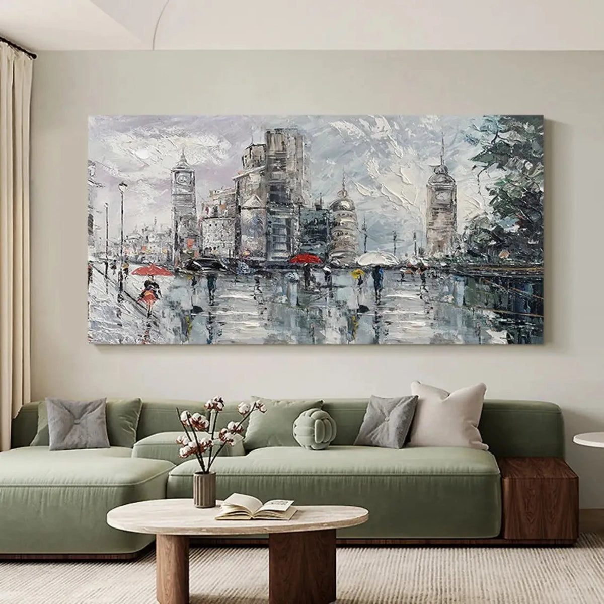 Room mockup showing rainy grey city street with tall buildings, small figures carrying umbrellas, red accents and wet reflections.