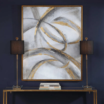 Room mockup showing looping grey and gold-coloured curves crossing a soft white and pale grey background.