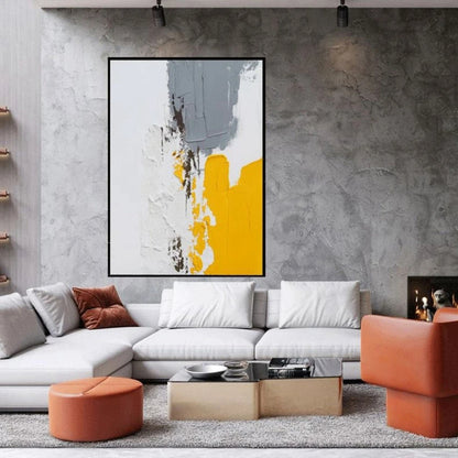 Room mockup showing textured white abstract with a grey upper block, mustard yellow lower block and narrow dark brown marks.