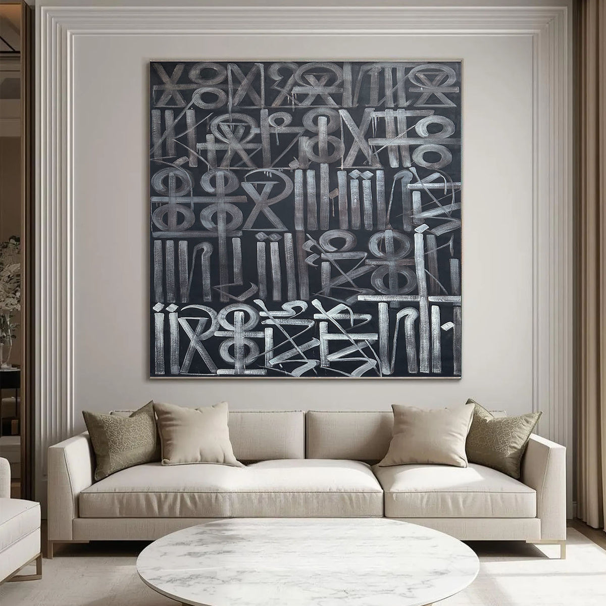 Hand-painted abstract calligraphic symbol artwork in white and grey on a black background.