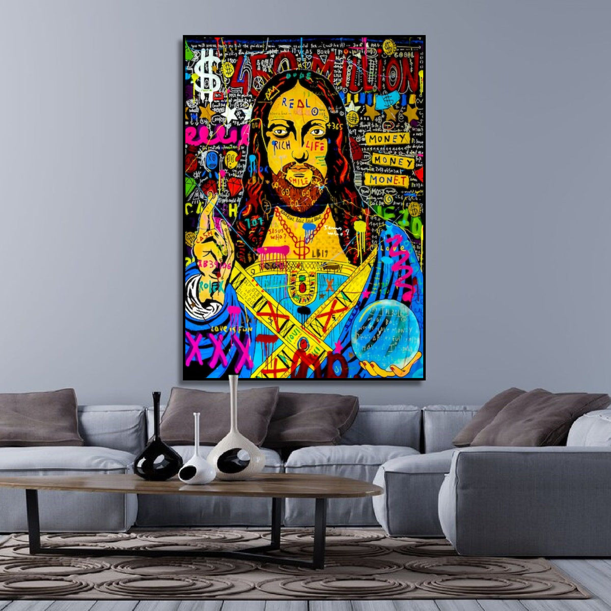 Room mockup showing yellow-faced Jesus pop art portrait with long dark hair, blue and pink robes, dollar symbols and graffiti lettering.
