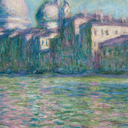Detail of the Venetian waterfront and pastel canal water.