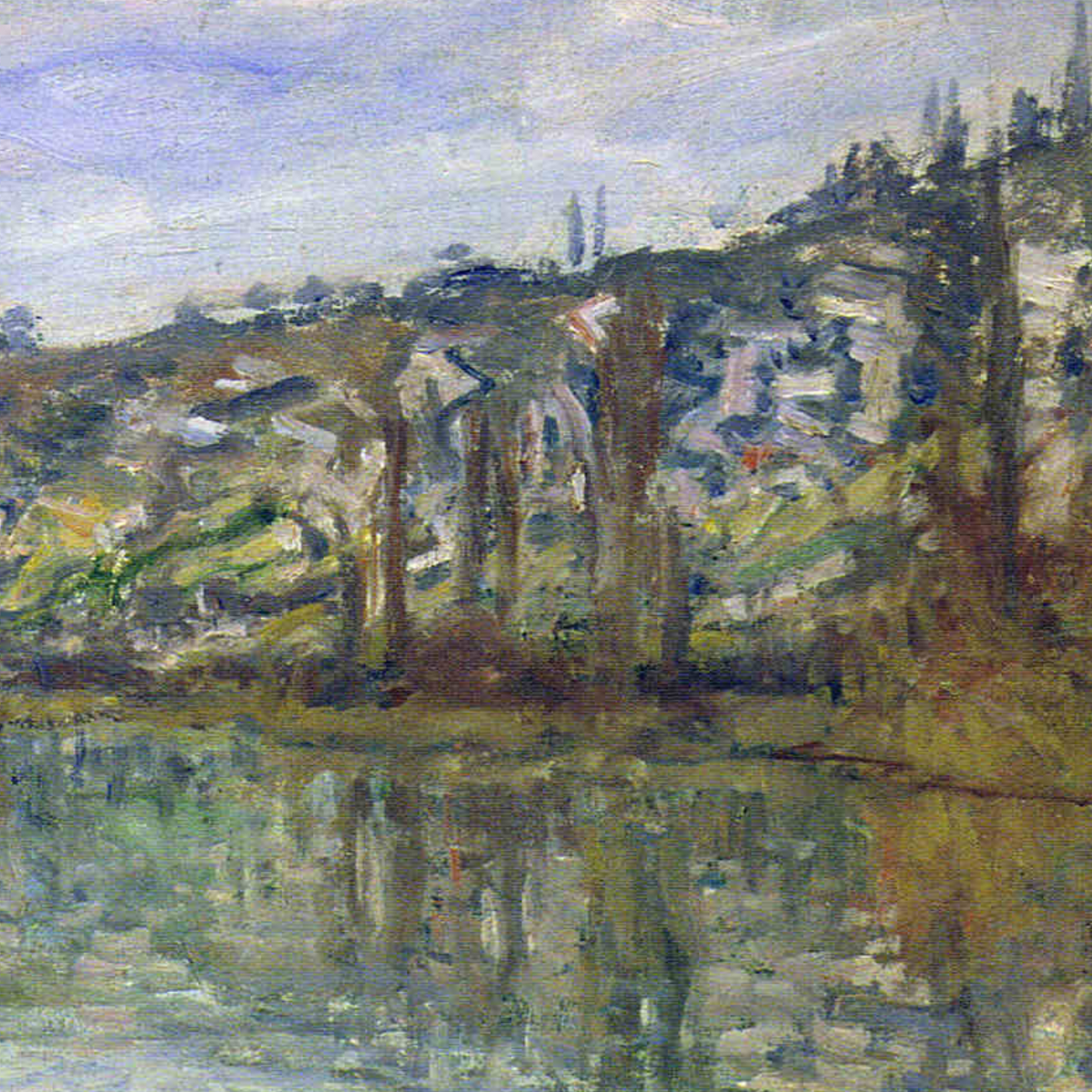 Detail of hillside buildings and trees reflected in still water.