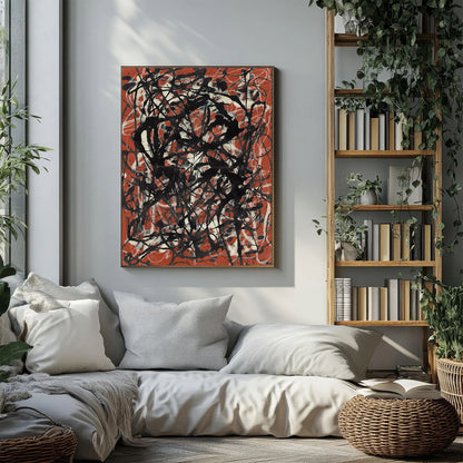 An abstract canvas painting with black scribbled lines over a terracotta orange and cream background, hanging on a light gray wall above a modern white sofa in a styled living room.