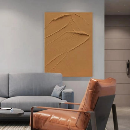 Room mockup showing ochre textured abstract with a raised sweeping ridge and fine diagonal grooves.