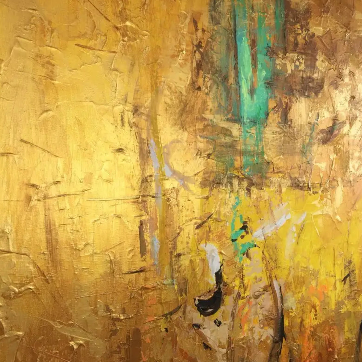 Close-up. A warm ochre and yellow textured field with small green patches, fine dark marks and a narrow white streak.