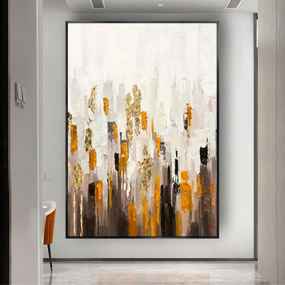 Room mockup showing abstract cityscape with orange, brown and grey vertical building-like strokes rising into a broad white upper field.