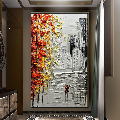 Room mockup. Raised orange, yellow and white tree-like marks beside grey buildings, with a small red figure on the street.