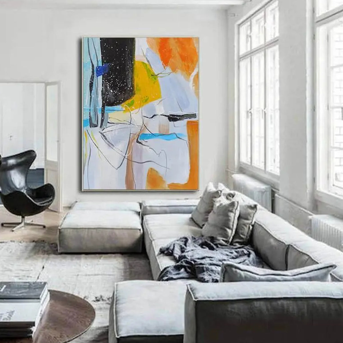 Room mockup. Pale blue and white fields with orange, yellow and black patches, thin scribbled lines and fine white splashes.