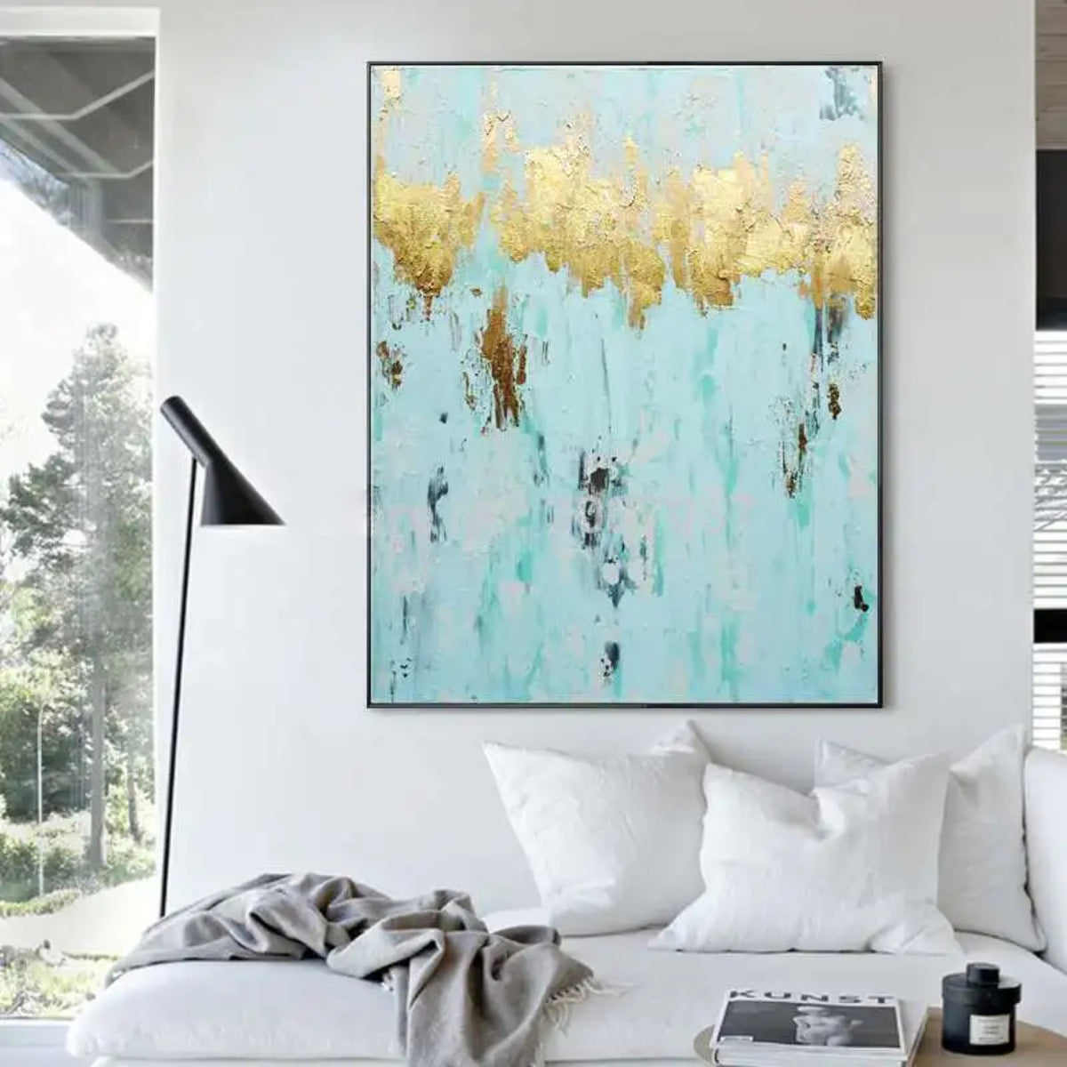 Room mockup. A jagged gold-coloured band stretches across pale turquoise, with scattered brown and dark grey marks below.