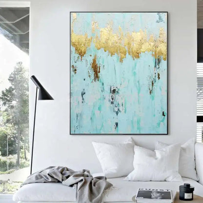 Room mockup. A jagged gold-coloured band stretches across pale turquoise, with scattered brown and dark grey marks below.