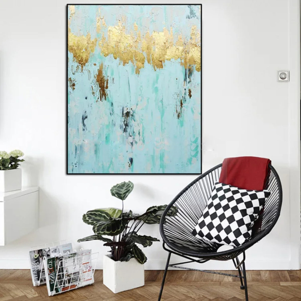 Room mockup. A jagged gold-coloured band stretches across pale turquoise, with scattered brown and dark grey marks below.