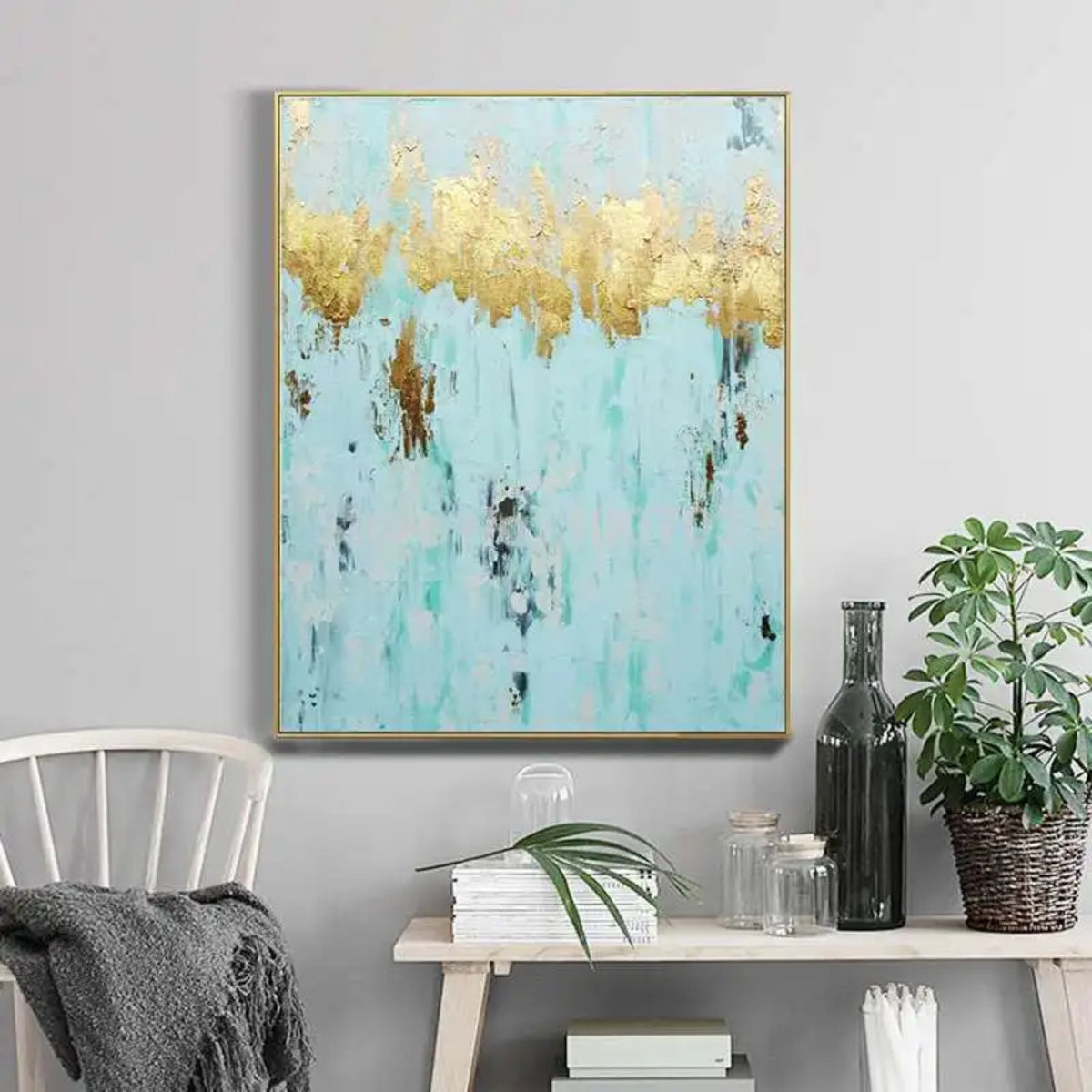 Room mockup. A jagged gold-coloured band stretches across pale turquoise, with scattered brown and dark grey marks below.