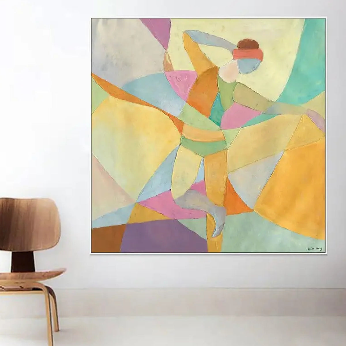 Room mockup. A dancer with one arm raised and one leg extended, formed from pastel yellow, mint, pink and blue geometric shapes.