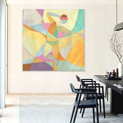 Room mockup. A dancer with one arm raised and one leg extended, formed from pastel yellow, mint, pink and blue geometric shapes.