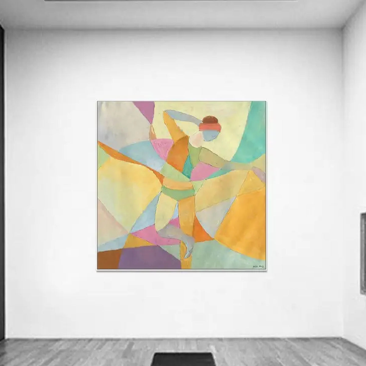 Room mockup. A dancer with one arm raised and one leg extended, formed from pastel yellow, mint, pink and blue geometric shapes.