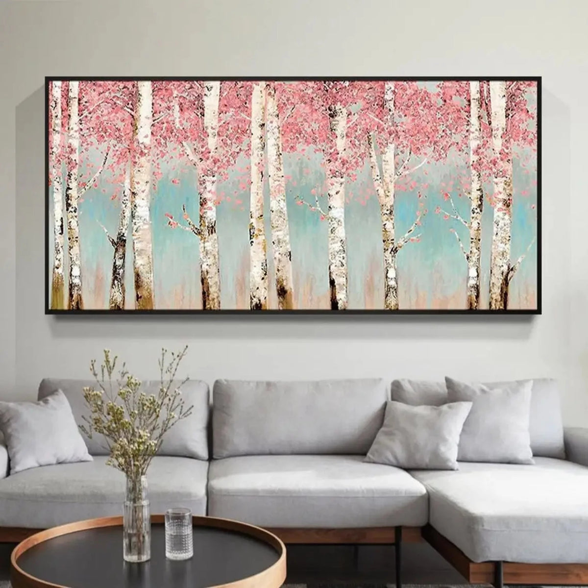 Room mockup showing white birch trunks beneath dense pink blossom-like foliage against a pale teal background.