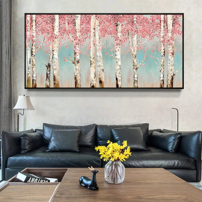 Room mockup showing white birch trunks beneath dense pink blossom-like foliage against a pale teal background.