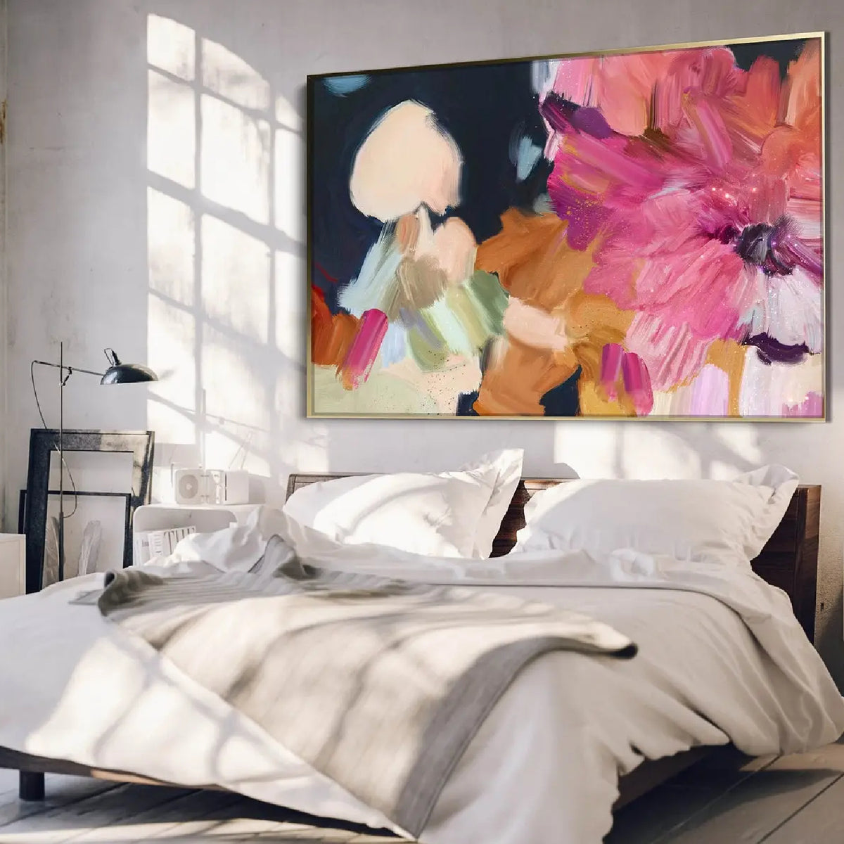 Room mockup. Large loose pink and coral petals with cream, peach and pale green patches against a deep navy field.