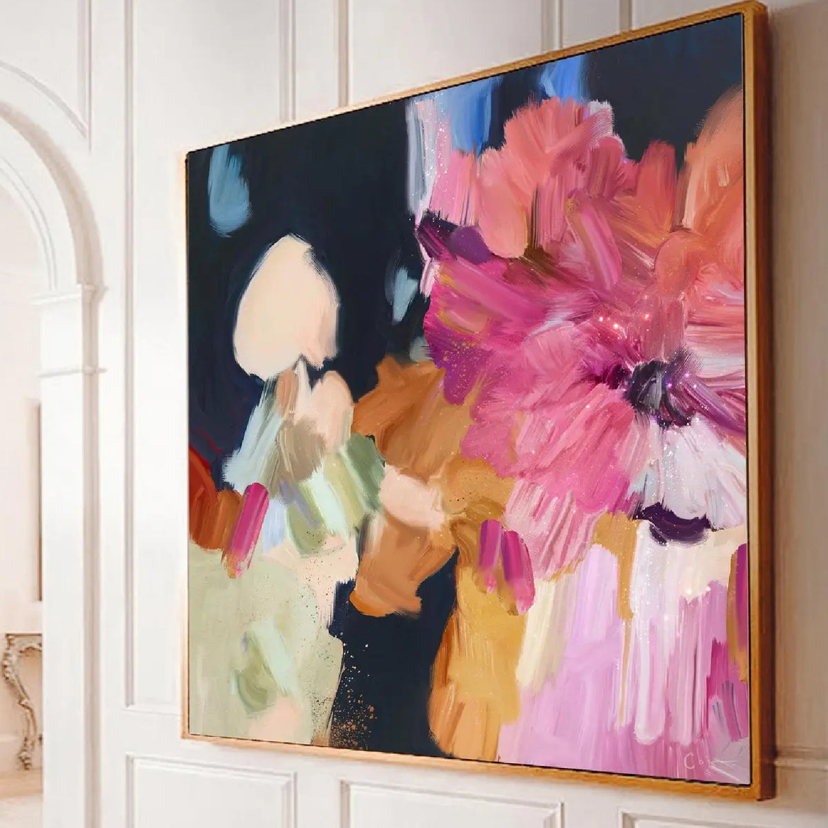 Room mockup. Large loose pink and coral petals with cream, peach and pale green patches against a deep navy field.