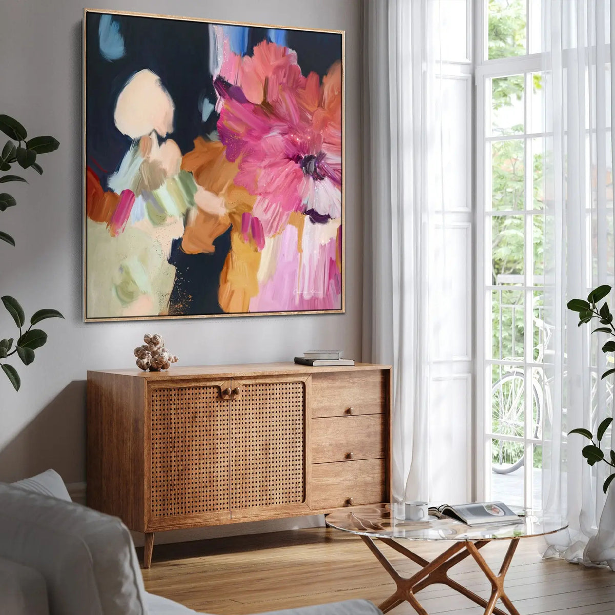Room mockup. Large loose pink and coral petals with cream, peach and pale green patches against a deep navy field.