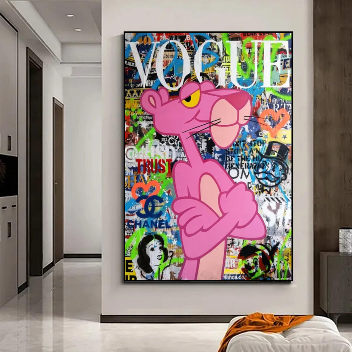 Room mockup showing pink Panther with crossed arms against a dense green, blue and orange graffiti collage beneath white Vogue lettering.