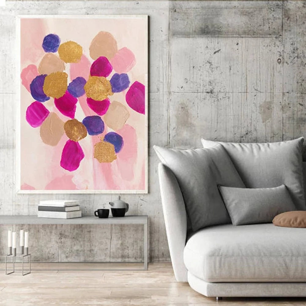 Room mockup showing rounded pink, magenta, purple and gold-coloured patches clustered over a pale blush background.
