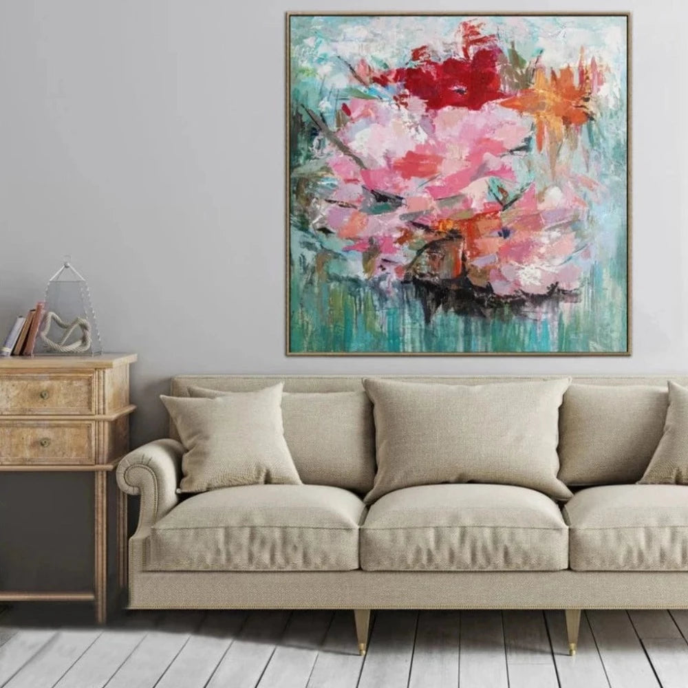 Room mockup showing large pink blossoms with red and orange flowers against a textured turquoise-green background.