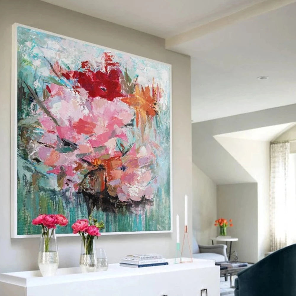 Room mockup showing large pink blossoms with red and orange flowers against a textured turquoise-green background.
