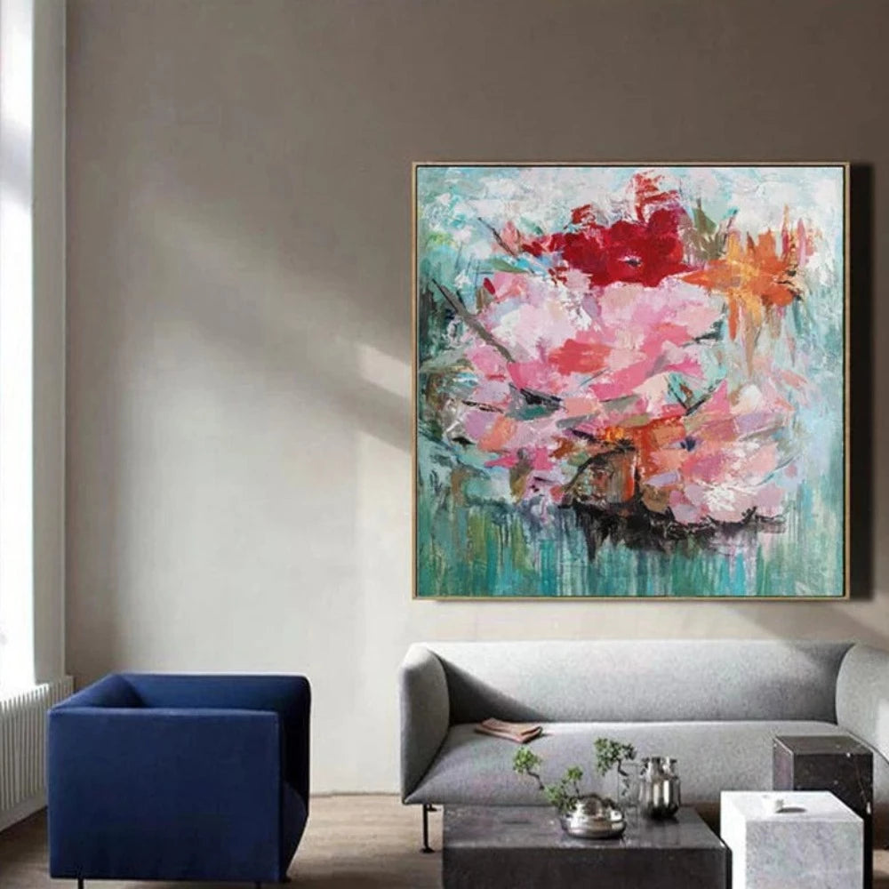 Room mockup showing large pink blossoms with red and orange flowers against a textured turquoise-green background.