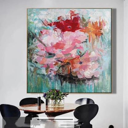Room mockup showing large pink blossoms with red and orange flowers against a textured turquoise-green background.