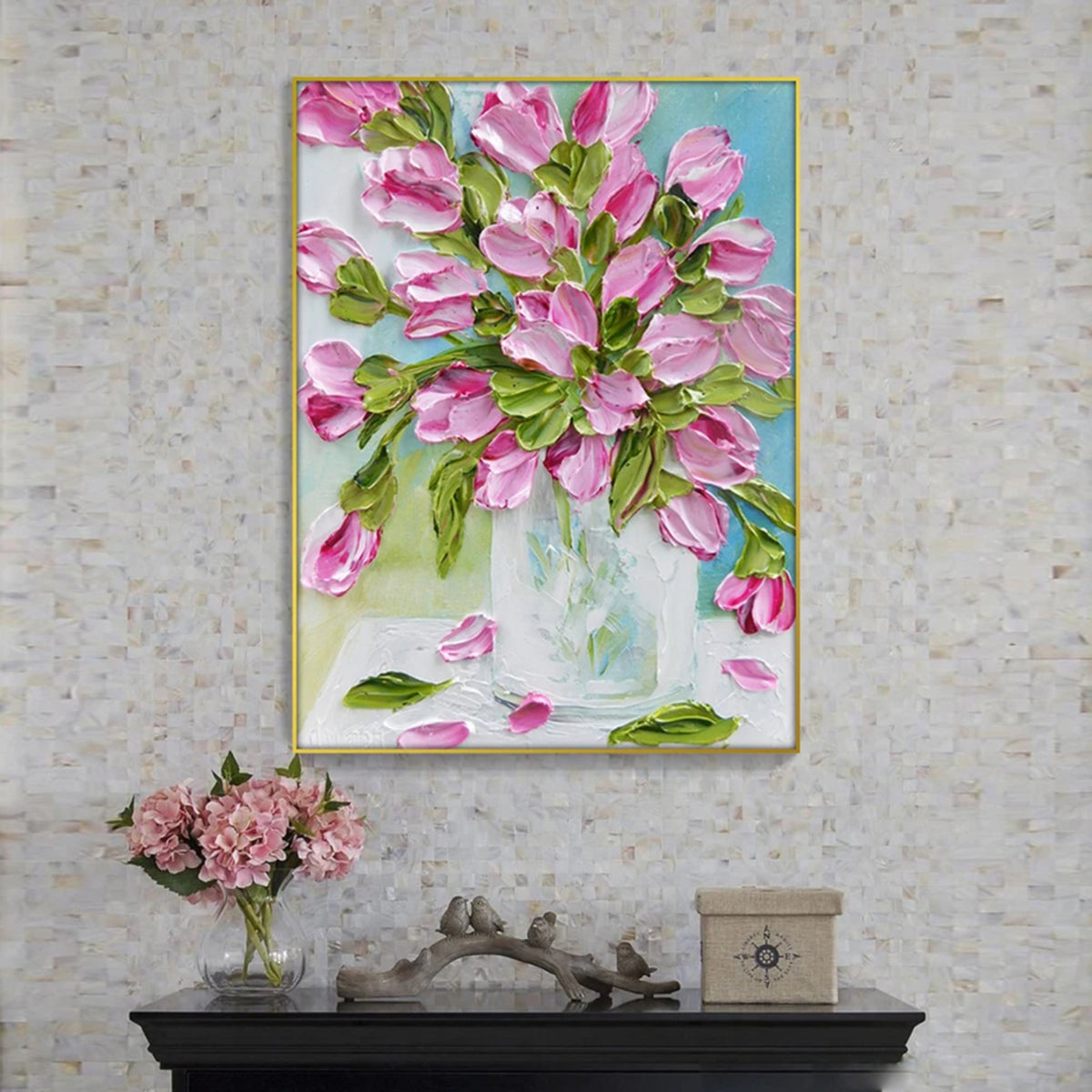 Room mockup showing pink tulips and green leaves in a translucent pale blue vase against a light background.
