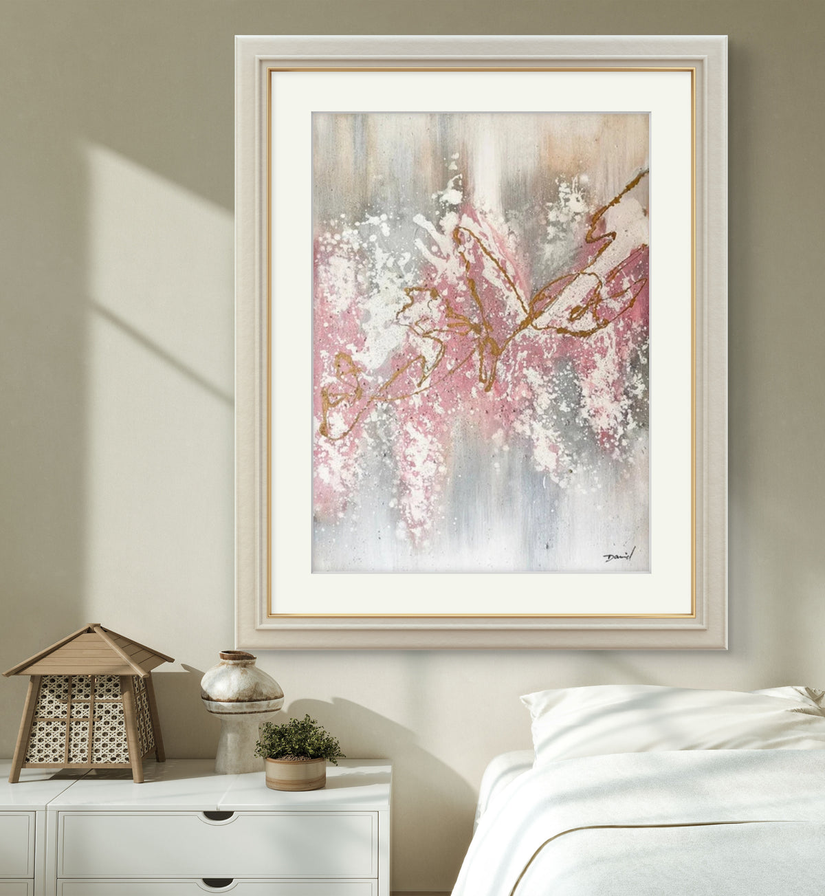 Room mockup showing pink and white blossoms on gold-coloured branches against a vertically streaked grey and cream background.